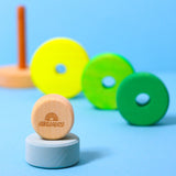 Einzelteile von kleinem Holz-Scheibenturm von Grimm's in Neongrün