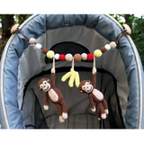 Gehäkelte Kinderwagenkette Affe CHARLIE in Braun von SindiBaba_Fair-Trade und in Handarbeit hergestellt_Kinderwagenkette an Kinderwagen