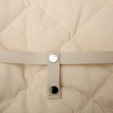 Detailansicht Druckknopf von Babywippe Levo von Charlie Crane mit Bezug Organic Farrow