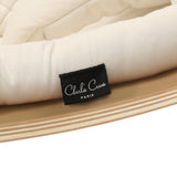 Detailansicht Label von Babywippe LEVO von Charlie Crane mit Bezug in Organic Milk Farbe