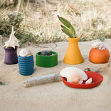 Sechs bunte Holzgefäße von Grapat