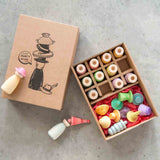 Geöffnete Verpackung von 12 Fancy Nins von Grapat mit Hüten