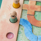 Detail des Londji Best Friends mit Hasen- und Otterfiguren sowie verschiedenen Wegeteilen