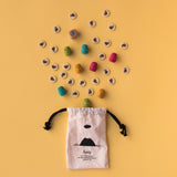 Stoffbeutel mit Inhalt von "Win win winter" Strategiespiel von Londji