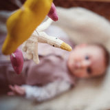 Kind liegt unter Mobile Sonnenaufgang von Senger Naturwelt