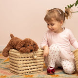 Kind mit Schlenkerhund braun von Teddy Hermann