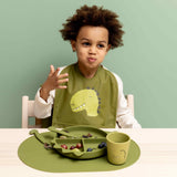 Kind mit wasserabweisendem Lätzchen Mr. Dino von Trixie