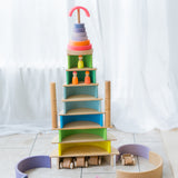 Turm aus Regenbogen Motorikspiel von Grimm's aus Holz in Neongrün