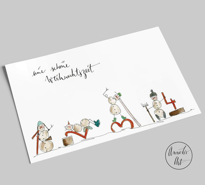 Postkarte mit Weihnachtsmännern von Annelis Art mit Spruch "Eine schöne Weihnachtszeit"