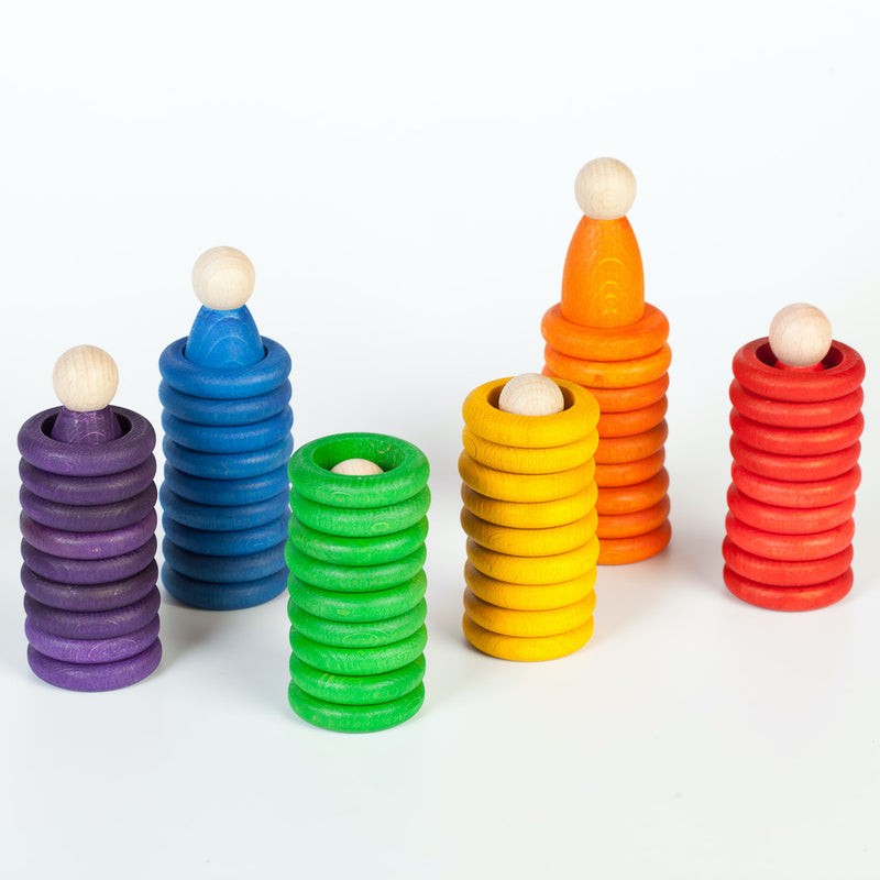 Grapat Spielset aus Nins, Münzen und Ringen in Regenbogenfarben aufeinander gestapelt
