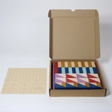 Geöffnete Verpackung von Baukasten Rhythm aus der Grimm's Tiny Art Collection 