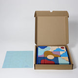 Geöffnete Verpackung von Baukasten Wave der Tiny Art Collection von Grimm's