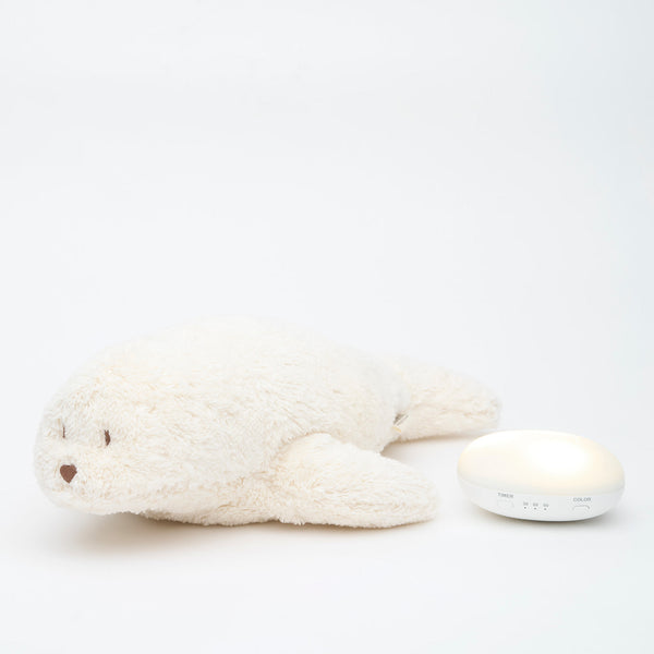 Moonie Robben Einschlafhilfe im Farbton Polarweiß mit Sound-/Lichtmodul