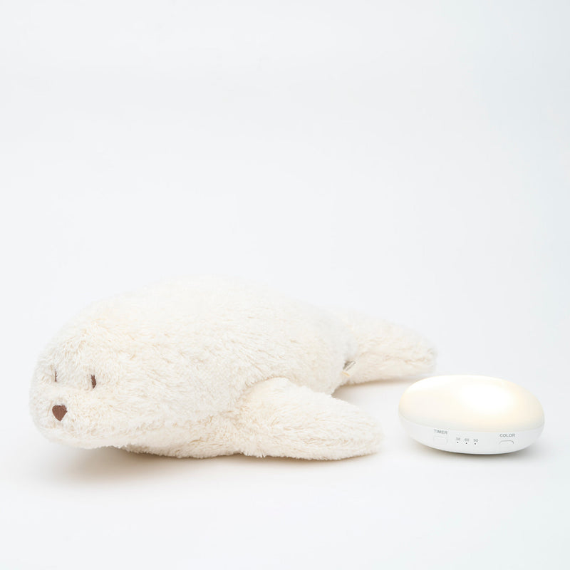 Moonie Robben Einschlafhilfe im Farbton Polarweiß mit Sound-/Lichtmodul