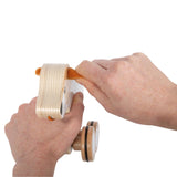 Nachziehtier Hund mit Knisterohren von small foot in Händen gehalten